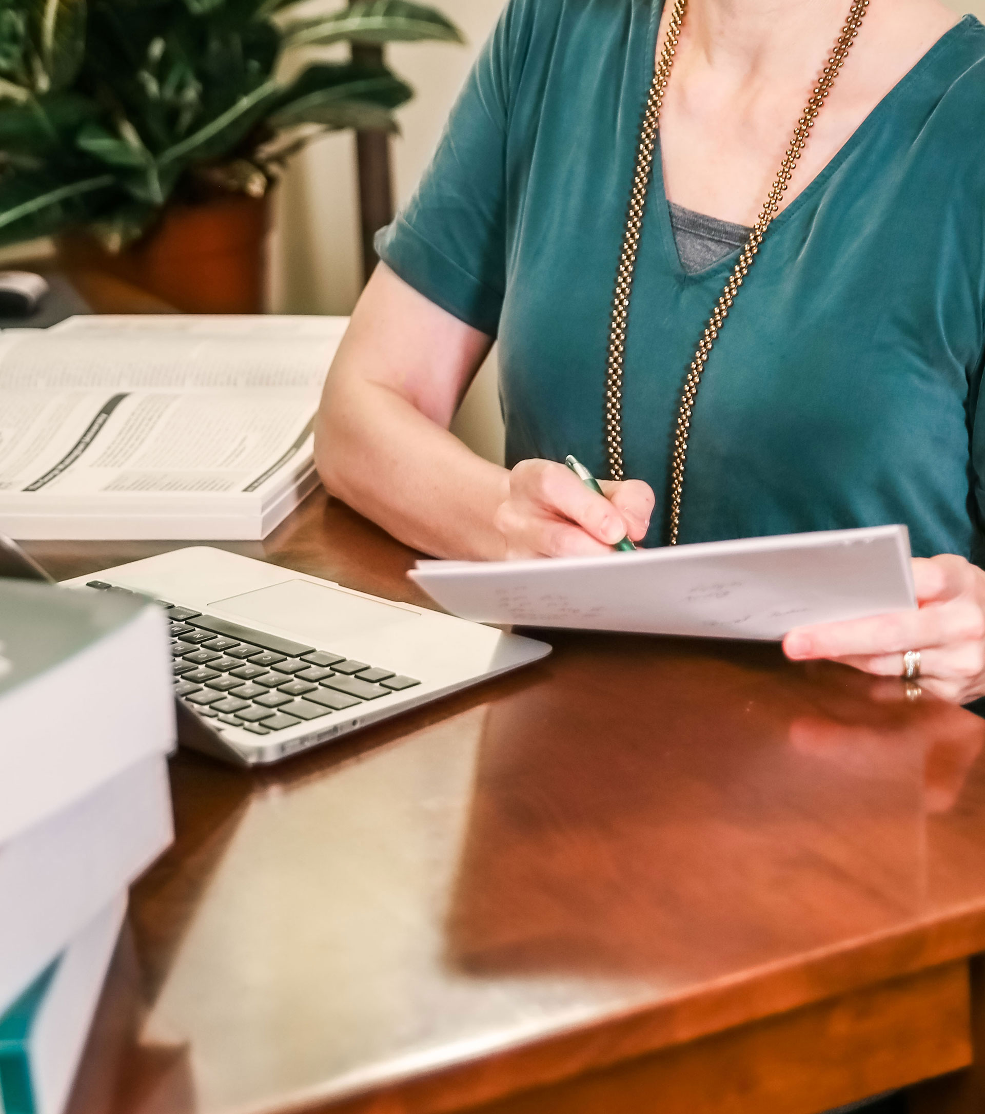 Stephanie working at her desk.